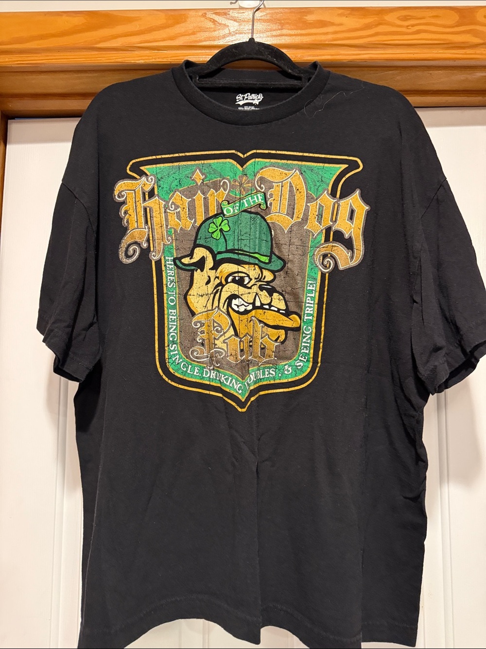 St. Patrick Black Tee with Green & Gold Bulldog Crest